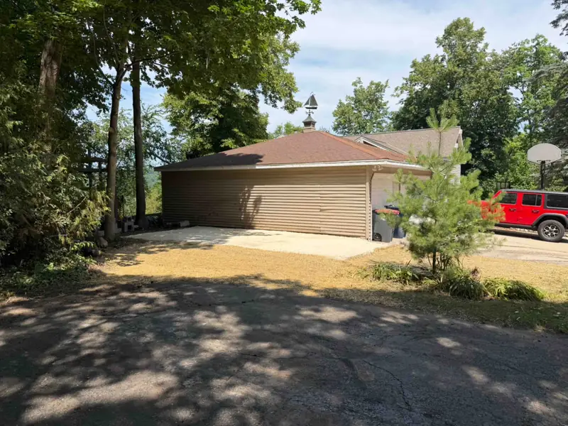 Side yard by the garage after